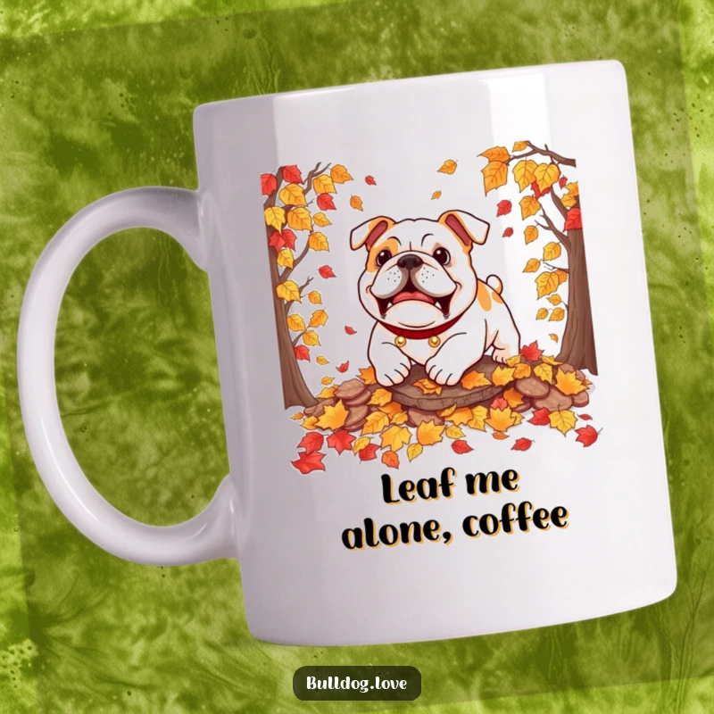 Funny bulldog mug showing a dog playfully pouncing on a rustling pile of colorful autumn leaves with great enthusiasm.