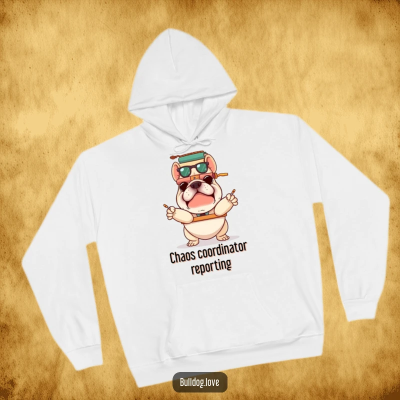 Funny bulldog in the process of balancing many stacked items precariously, depicted on a warm hoodie, radiating comical effort.