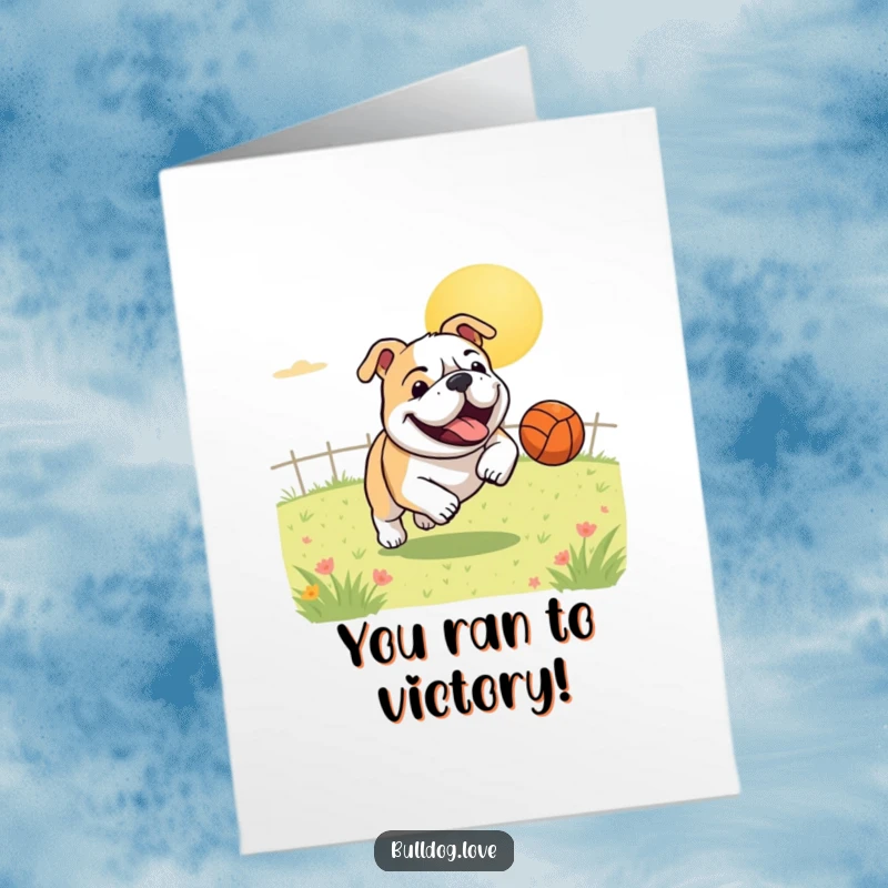 Funny free printable congratulations card: a bulldog gleefully chasing a bouncing ball across a sunny field.