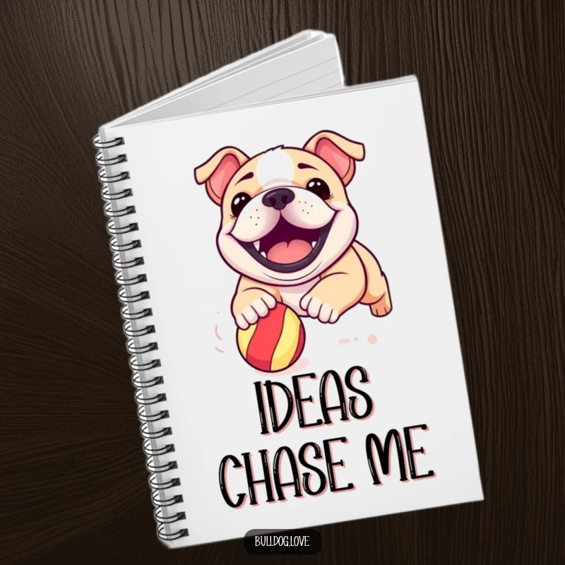 Funny bulldog pup notebook cover with a dog’s wide, ecstatic grin, captured mid-play chasing a ball.