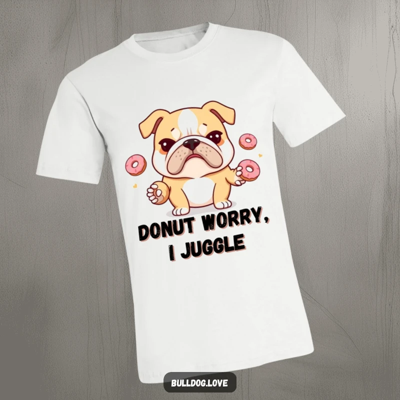 Funny bulldog t-shirt featuring a bulldog with a furrowed brow trying to juggle small donuts, depicting relatable stress and humor.