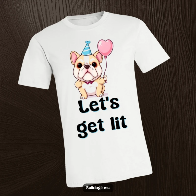 Funny bulldog t-shirt with a dog sporting a cute party hat and cheerfully holding onto a festive balloon.