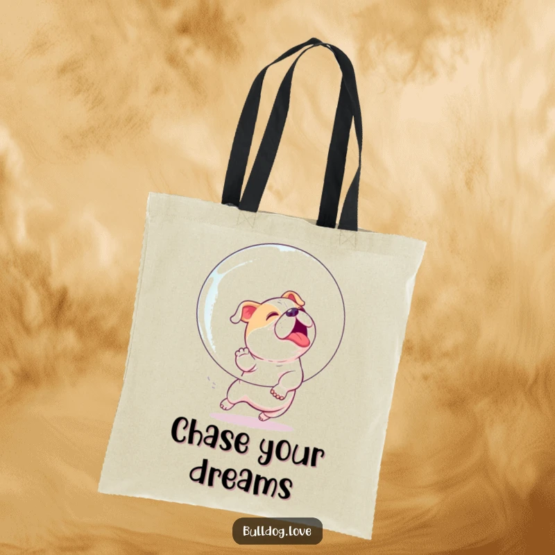 Funny tote bag featuring an enthusiastic bulldog playfully chasing a giant, shimmering bubble with pure joy.