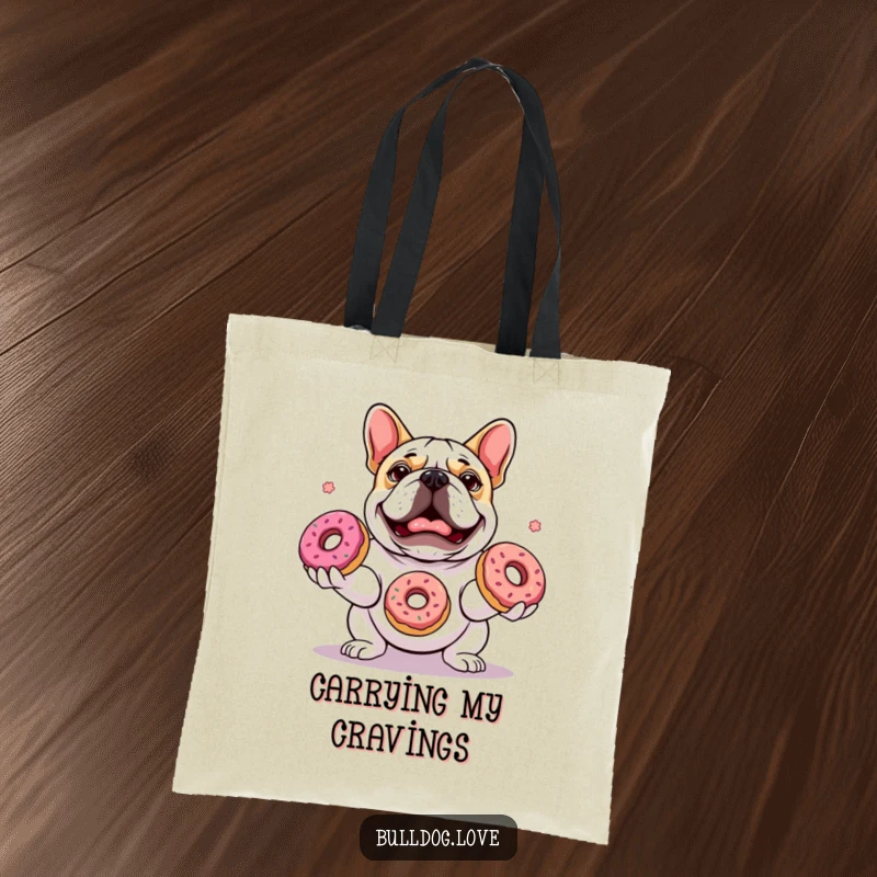 Funny tote bag featuring a determined bulldog juggling three colorful donuts with intense, delightful focus and a cheerful attitude.